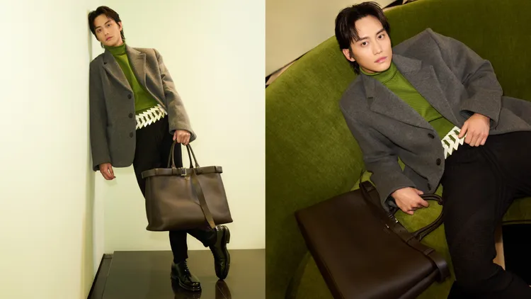 范少勳，鐵灰色羊毛大衣13萬5000元、綠色尼龍高領上衣3萬6500元、Buckle 深棕色皮革肩背包23萬元。品牌提供