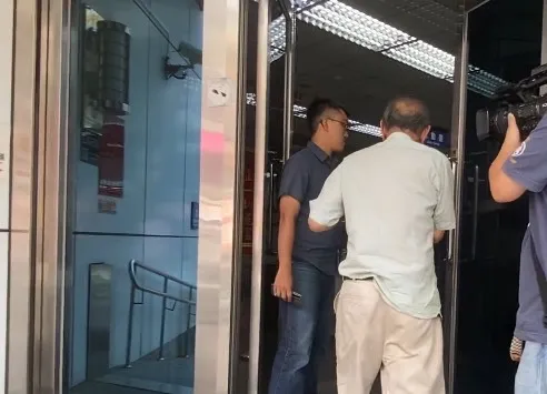 董念台到案。警方提供