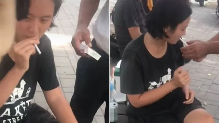 林靖恩被拍到在公園與疑似街友的民眾一起抽菸、喝酒。翻攝「黑色豪門企業」