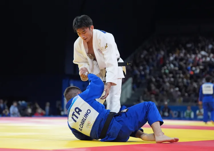 楊勇緯首戰逆轉勝。   中華奧會提供