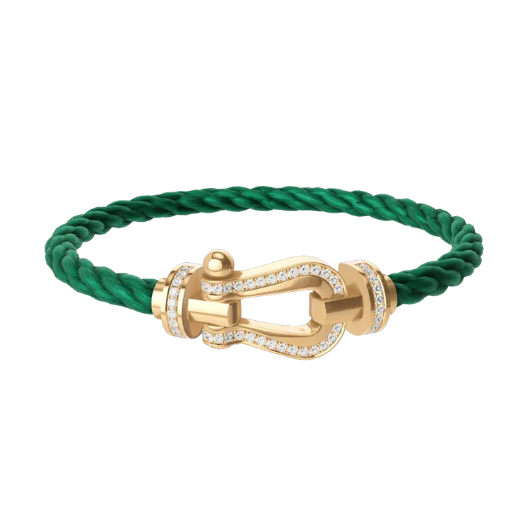 FRED FORCE 10系列 18K黃金鑽石及祖母綠鍊繩手鍊。品牌提供