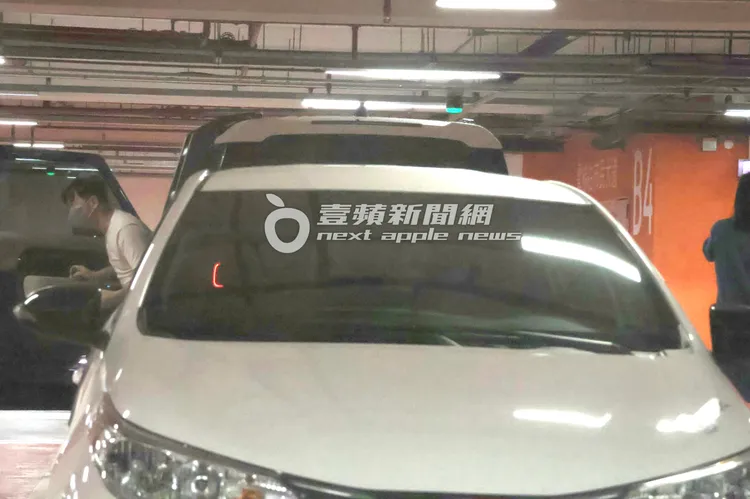 李聖傑（左）戴口罩相當低調。特勤中心攝