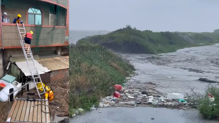 彰化縣濁水溪口暴漲，大水沖過堤防造成大城鄉民宅淹水，消防人員架梯協助居民脫困。民眾提供