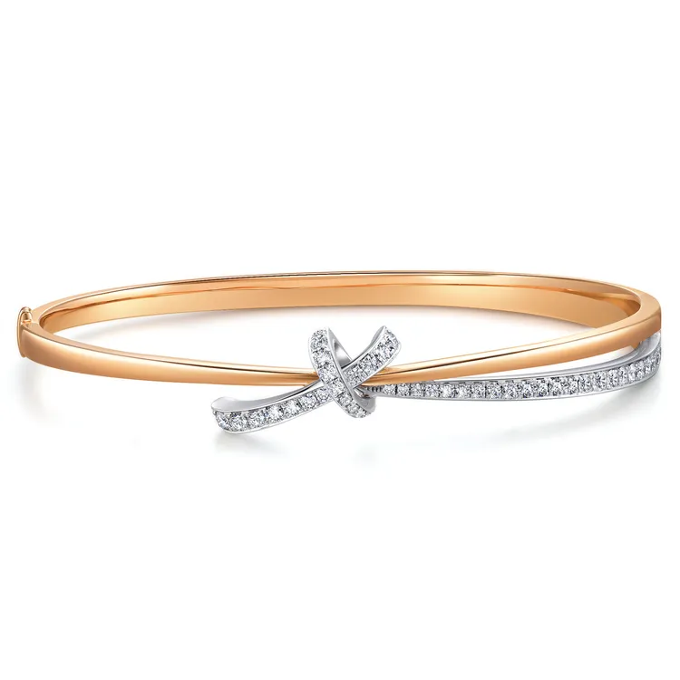 PROMESSA 同心結
18K白金玫瑰金雙色鑽石手鐲，12萬900元。品牌提供