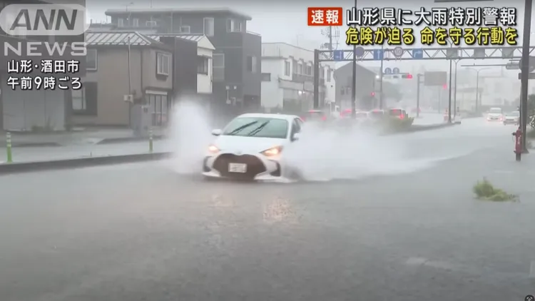 日本東北山形縣受豪雨侵襲並發布大雨特別警報。翻攝自ANN News