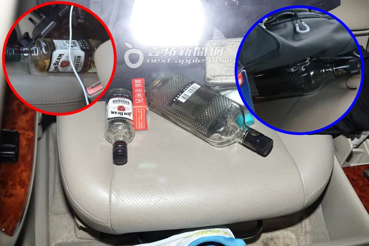 唐治平副駕駛座上的酒瓶，液體內容物與稍早相比明顯少了許多。特勤中心攝