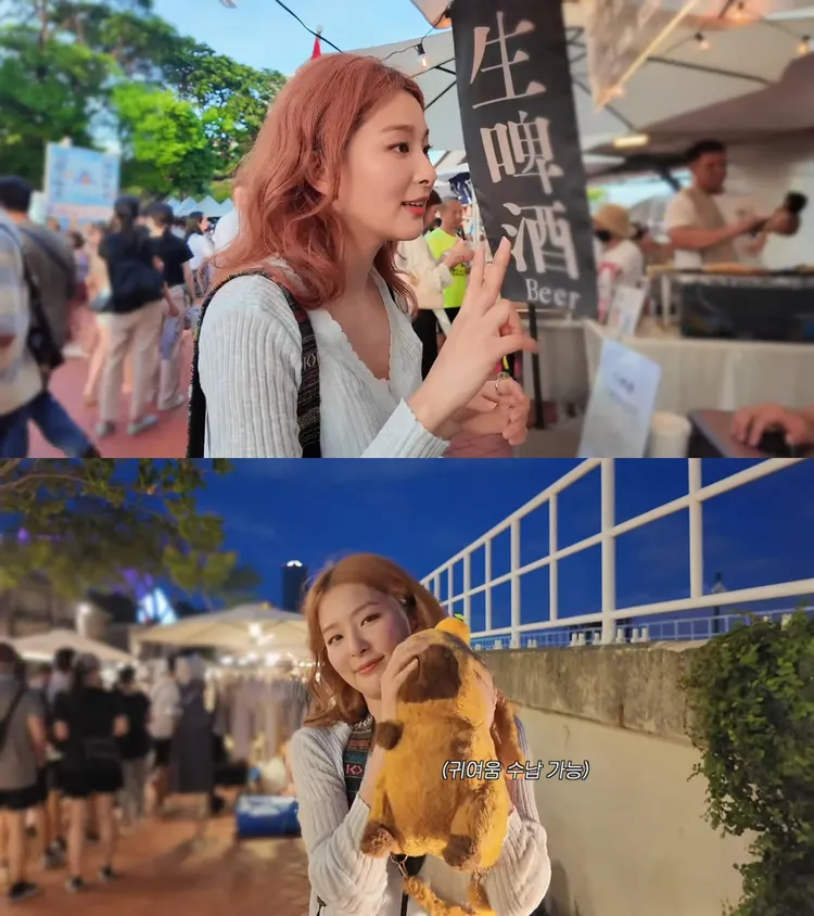 Seulgi在駁二市集逛得盡興，買啤酒被認出，入手水豚包包。翻攝Seulgi YouTube