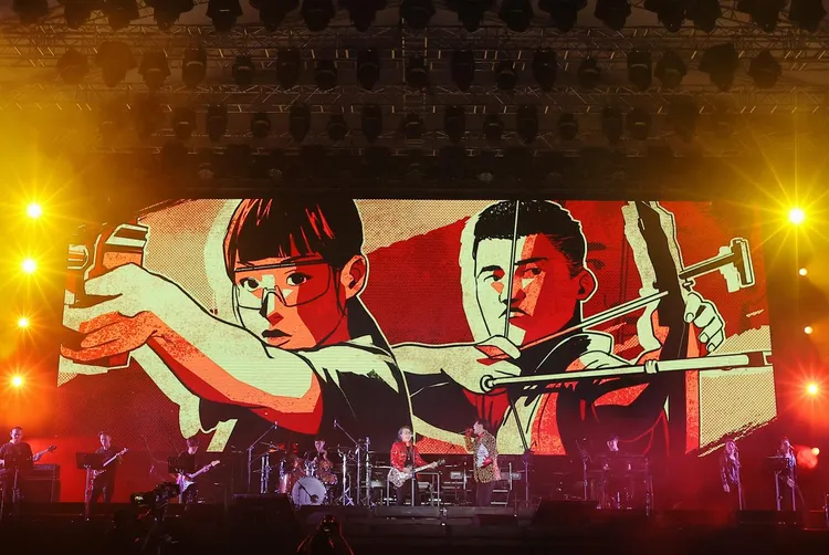 大螢幕放出台灣體育健將的漫畫人像。翻攝邵大倫臉書