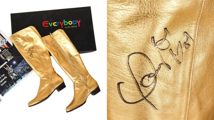 泰勒絲「Fearless
」巡迴演唱會訂製金色及膝長靴（附有簽名），估價約1000至2000美元（約3萬2000元至6萬3900元）。翻攝朱利安官網