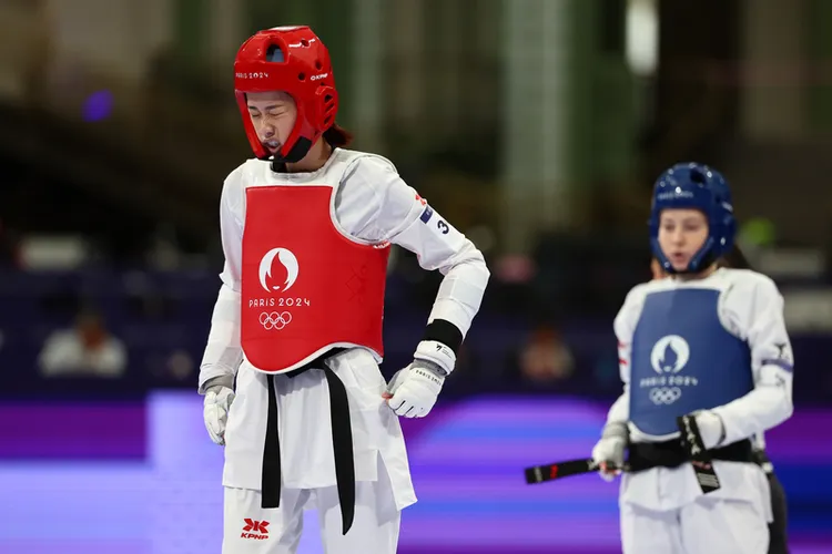 羅嘉翎忍痛出賽。  中央社