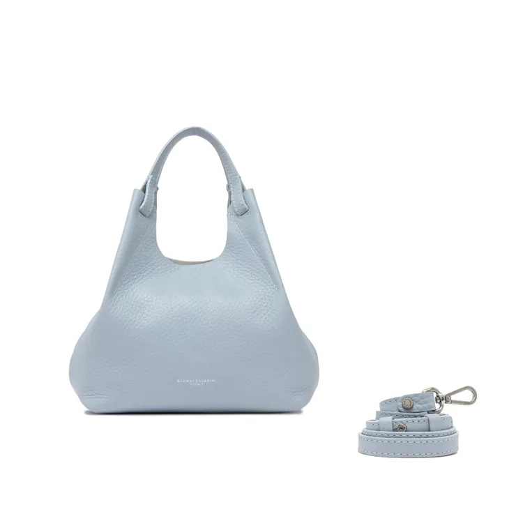 Dua皮革手提包，1萬3800元。品牌提供