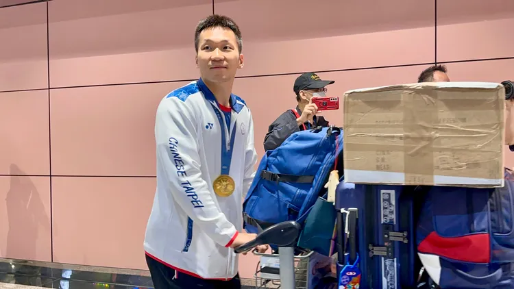 羽球黃金雙打國手李洋率先步入國門。特勤中心攝