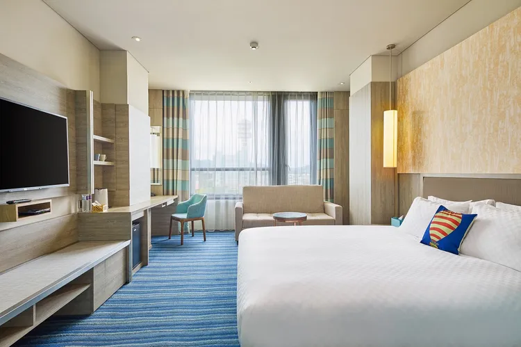 趣淘漫旅-台東探索客房一大床。業者提供