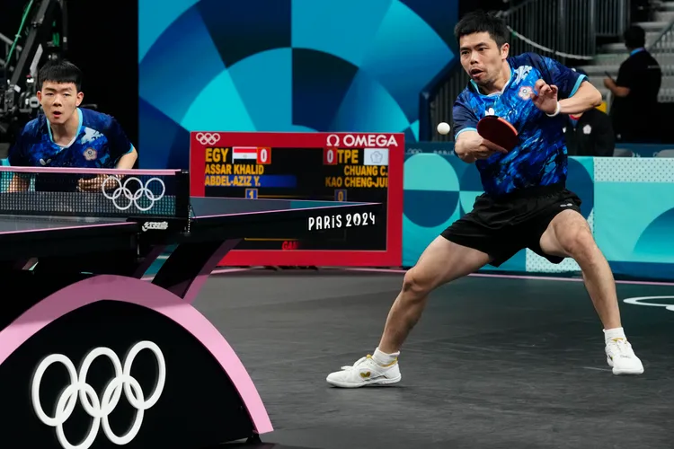 莊智淵聯手徒弟出賽。  美聯社