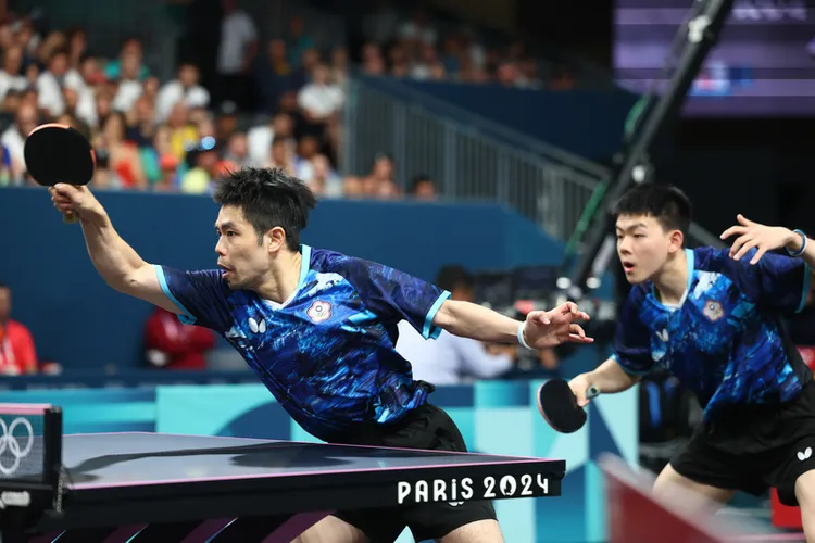 台灣「桌球教父」莊智淵（左）與愛徒高承睿（右）本屆攜手組雙打。中央社