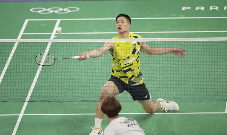 周天成(後)。美聯社