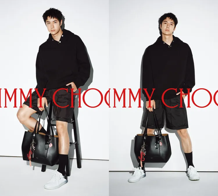 王一博換上黑色帽T、黑色短褲搭配放大輪廓的DIAMOND托特包。品牌提供