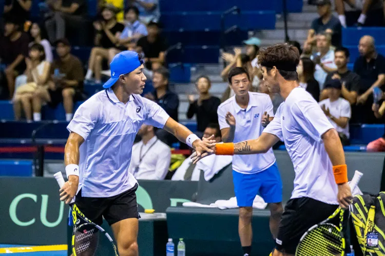 許育修與何承叡雙打獲勝。網協提供
