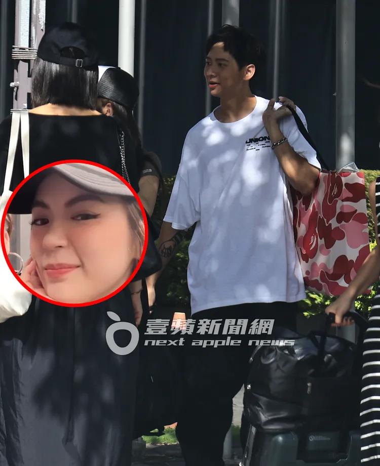 實境秀記者會結束後，金陽提著包包，與女友Bibi走出攝影棚。特勤中心攝