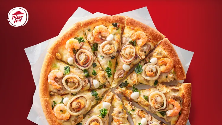 「分P取」服務能分次取用買一送一的大披薩。必勝客提供