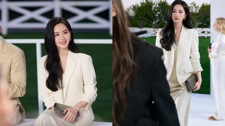 劉詩詩換上一身優雅白色洋裝搭配同色系外套現身秀場。品牌提供
