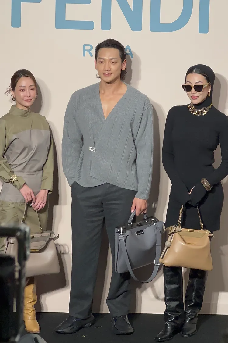 韓國巨星Rain（中）與蔡詩芸、謝欣穎一同出席FENDI新光三越Diamond Towers鑽石塔開幕活動。特勤中心攝