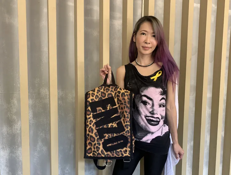 Makiyo身穿Enzo送的衣服、包包，送好友最後一程。林秭渝攝