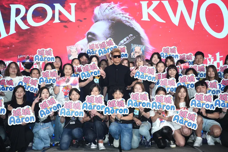 郭富城跟粉絲合影。彭欣偉攝