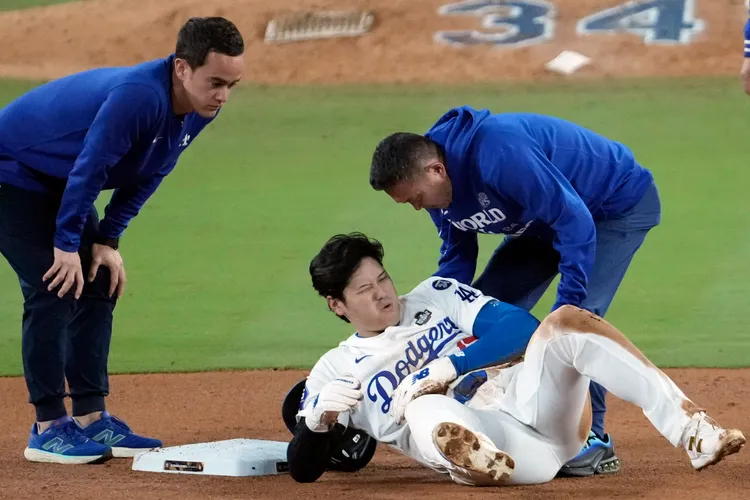 大谷翔平(中)受傷。美聯社