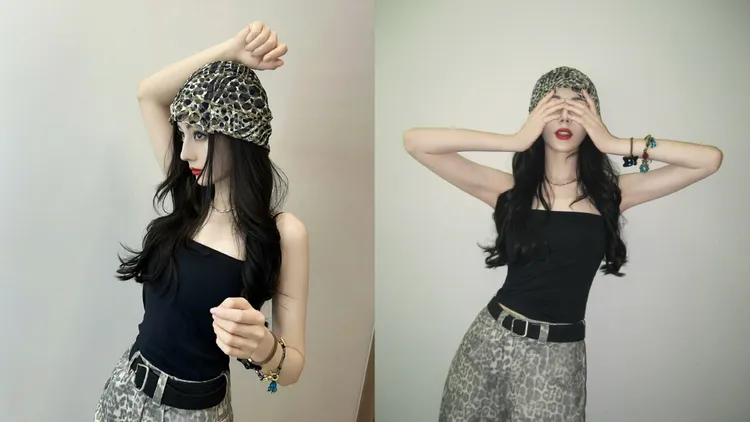 迪麗熱巴搭配黑色吊帶背心、豹紋寬褲、豹紋帽。翻攝迪麗熱巴微博