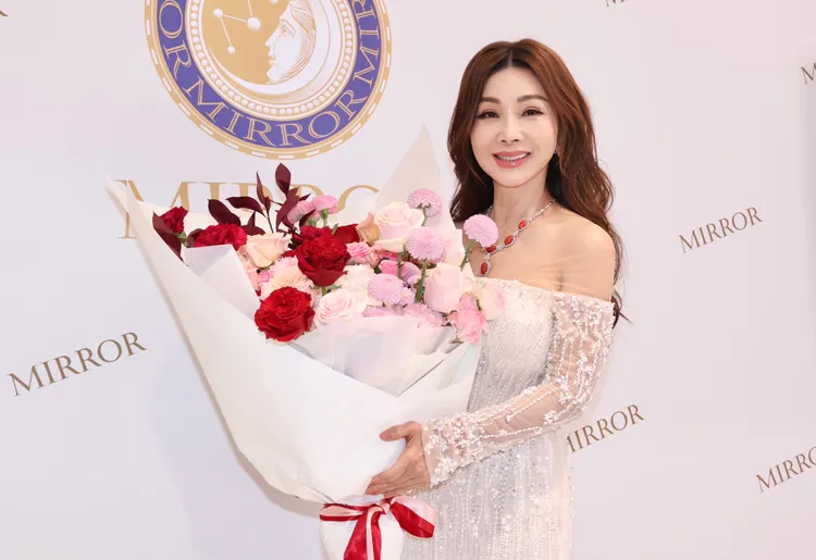 陳美鳳將珊瑚項鍊襯得閃閃發亮。莊宗達攝影