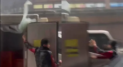 颱風太狂！貨車司機開車門　下一秒消失在鏡頭外