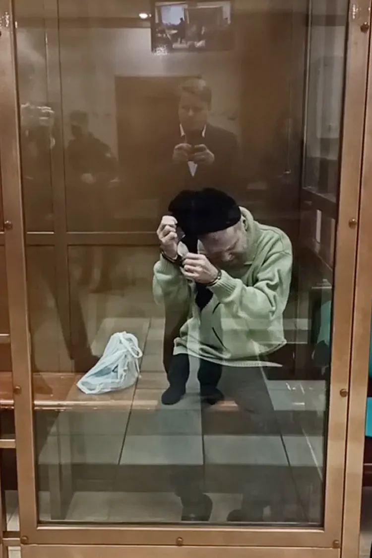 哈伯德聆判後陷入絕望。美聯社