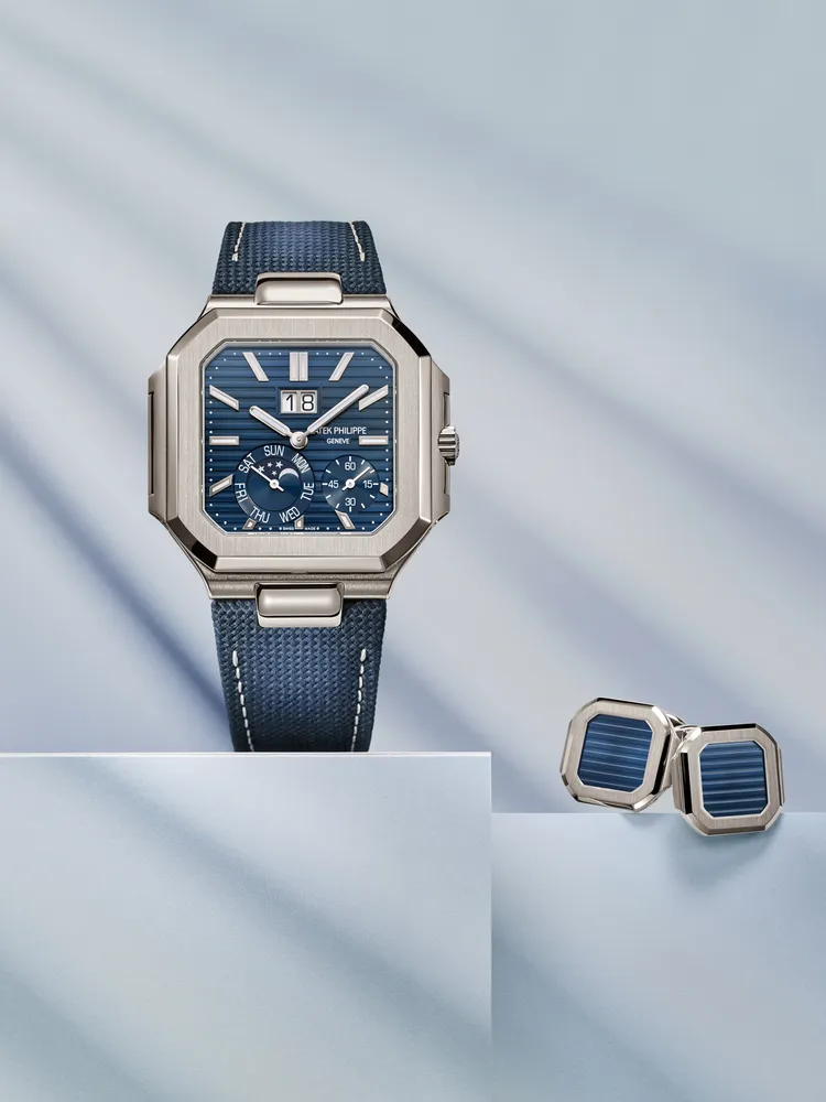 百達翡麗Cubitus 5822P-001瞬跳大日期、星期及月相腕錶，45mm，950鉑金錶殼，藍色放射狀紋理錶面，深藍色複合物料錶帶綴以織物圖案錶帶，240 PS CI J LU自動上鍊超薄機械機芯，動力儲存38小時，防水深度30米，286萬2000元。品牌提供