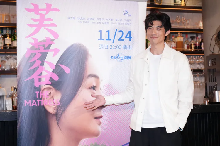 梁正群對生子隨緣。彭欣偉攝