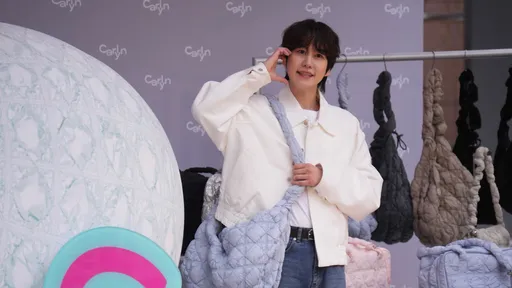 圭賢快閃信義區狂烙中文 200名粉絲冒雨熱情見偶像