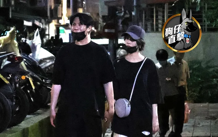 蔡淑臻與男友牽手散步，幸福洋溢。特勤中心攝