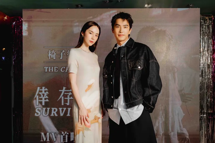 曾敬驊（右）與林奕嵐在《倖存者》MV上演虐戀。圖／明天的歌有限公司提供