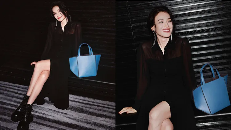 舒淇優雅演繹MICHAEL KORS JORDI霧藍色中型提包，1萬8500元。品牌提供