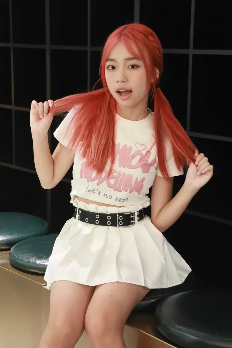 欣菲跟因為跟唱跳天后蔡依林都念「新莊國中」，她以「學姐」蔡依林為努力的目標。彭欣偉攝