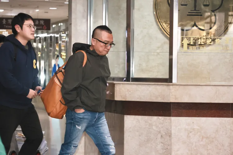 民眾黨秘書長周榆修前往北檢替柯文哲辦理交保。彭欣偉攝