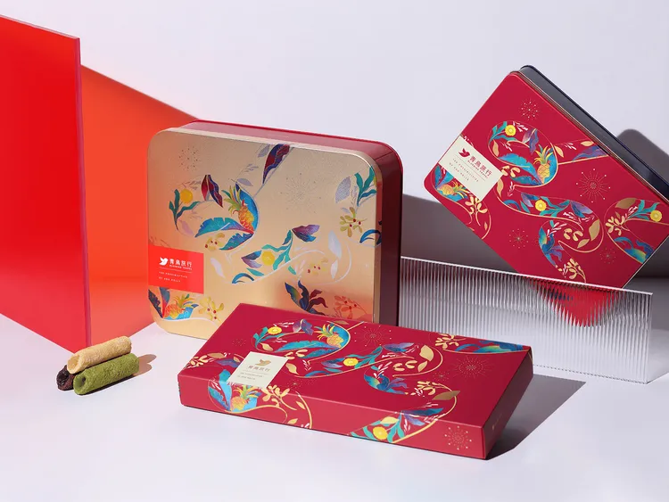 「青鳥旅行」「春舞金燦」春節禮盒，融入設計美感與味蕾享受，讓送禮者的體面與心意全面升級。業者提供