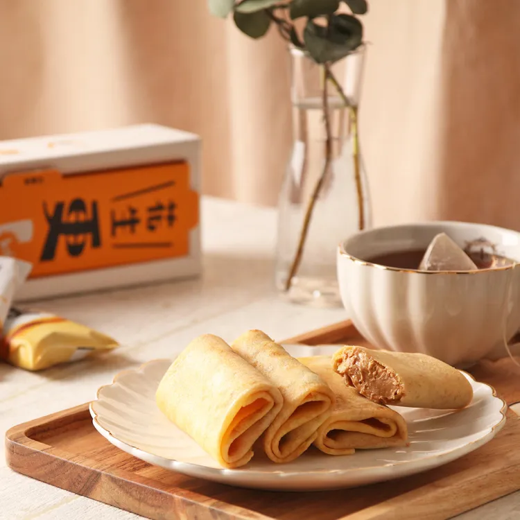 法式經典午茶可麗餅化身「更kńg法國食材可麗捲」迎新年主推3口味，「台南13號落花生」2023榮獲食品界米其林國際風味暨品質評鑑所iTQi二星殊榮，12入市價450元，預購價428元。業者提供