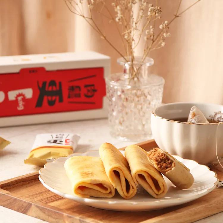 法式經典午茶可麗餅化身「更kńg法國食材可麗捲」迎新年主推3口味，「黃金18兩後腿肉鬆」12入市價450元，預購價428元。業者提供