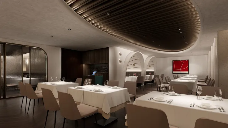 王品牛排桃園同德店新裝潢運用大理石材質打造流線造型弧牆，透過幾何堆疊，增添用餐空間的舒適感。業者提供