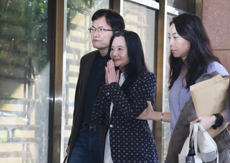 應曉薇在14：54分抵達。莊宗達攝