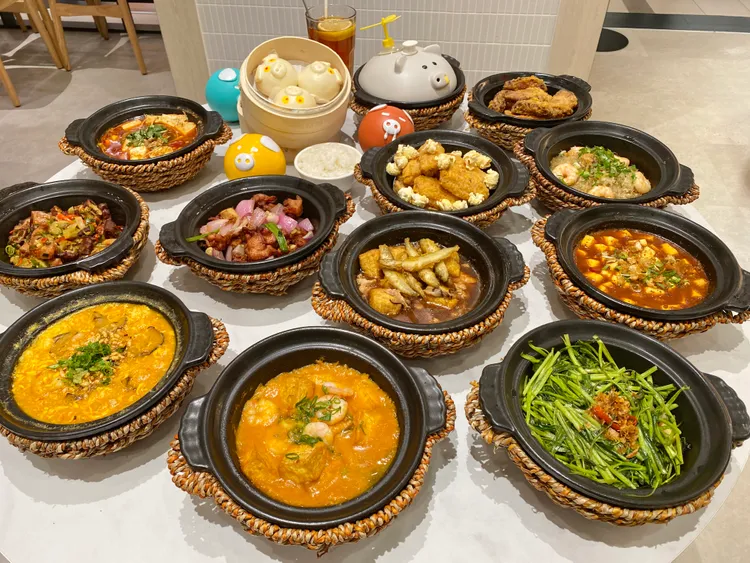 點點心11款全新餐點「港味豬豬煲」於中和環球店搶先開賣。莊偉祺攝