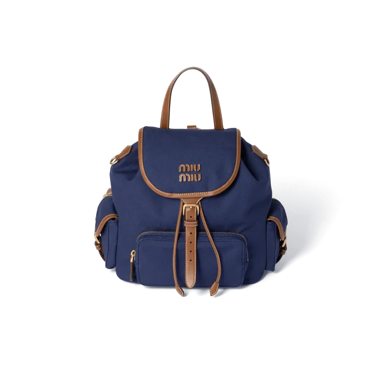 Miu Miu棉質與皮革後背包。品牌提供