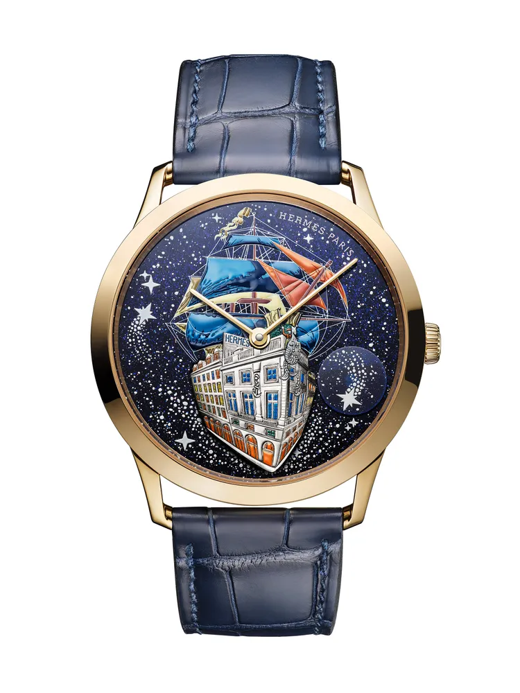 愛馬仕Slim d’Hermès Flagship工藝腕錶，39.5mm，黃K金錶殼，砂金石微繪錶盤，霧面深藍色短吻鱷魚皮錶帶，愛馬仕自製H1950超薄自動上鍊機芯，動力儲存48小時，防水深度30米，限量12只，價格店洽。品牌提供