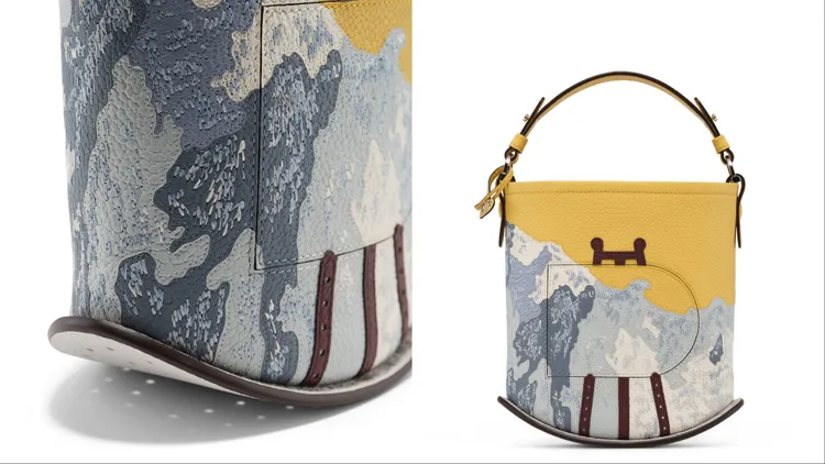 Pin Mini水桶包運用皮革細工鑲嵌完整呈現出原作品的色彩變化。品牌提供